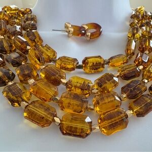 Talbot’s 4 tiered amber colored acrylic Necklace and small hoop Earring Set